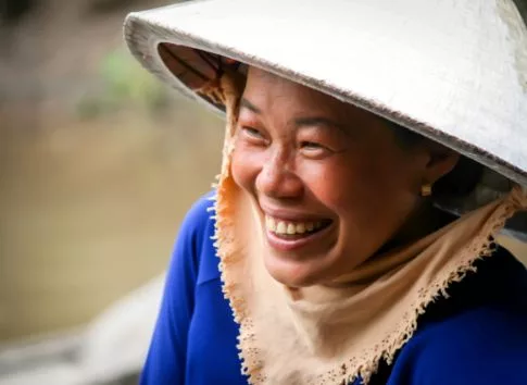 Give - woman from southeast Asia