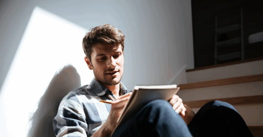guy writing missionary fundraising letter