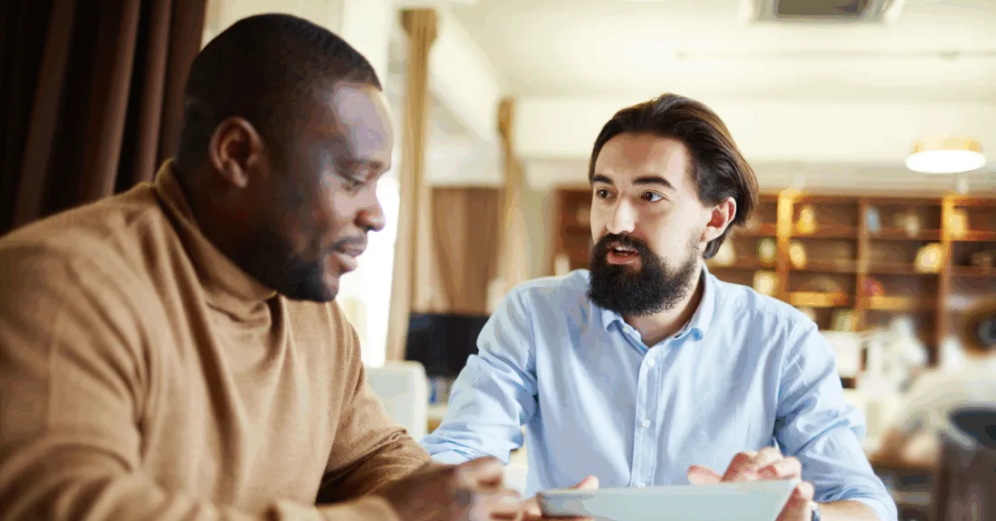 man donating to missionaries